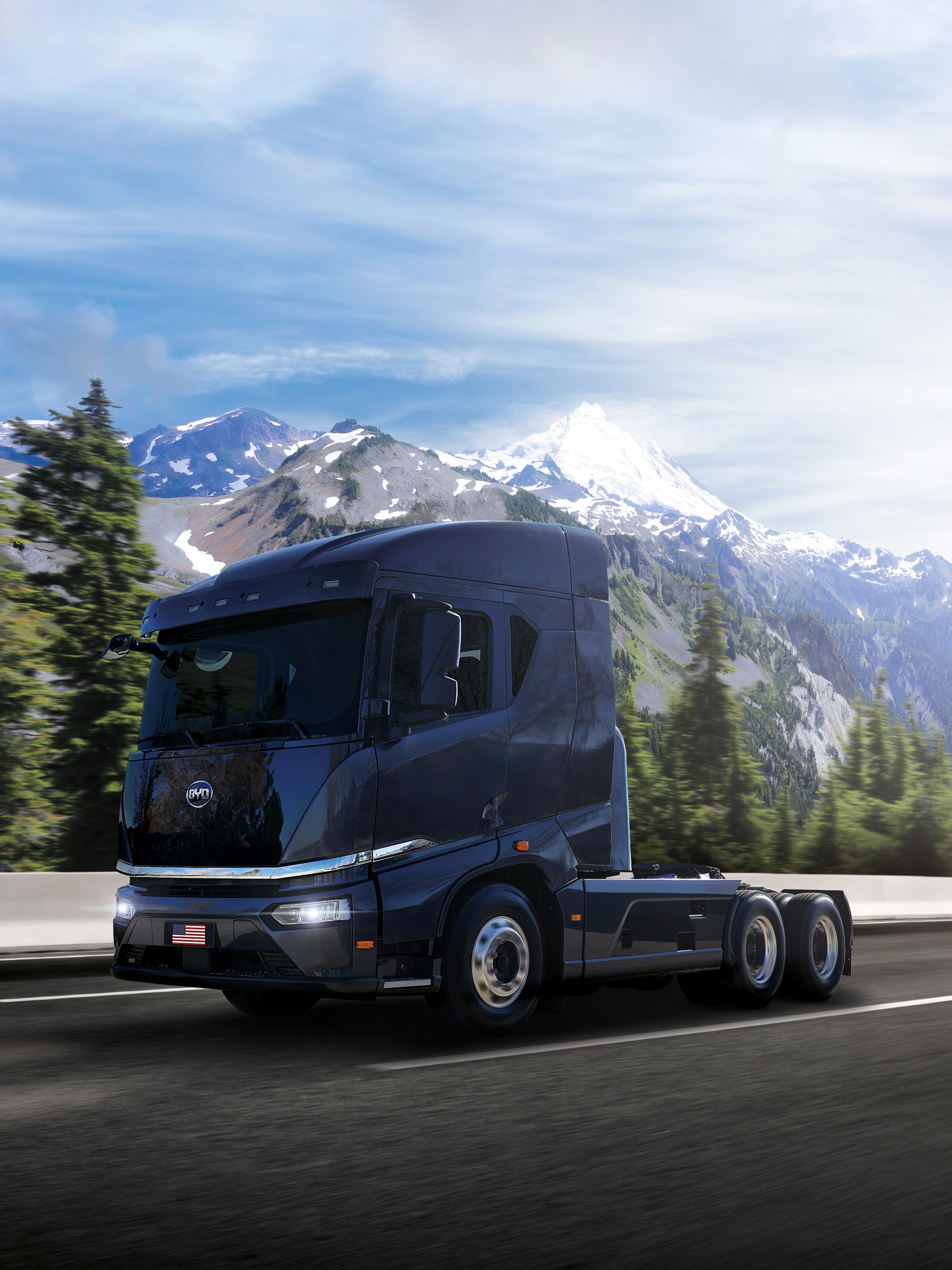 a BYD semi truck EV driving on a mountain road