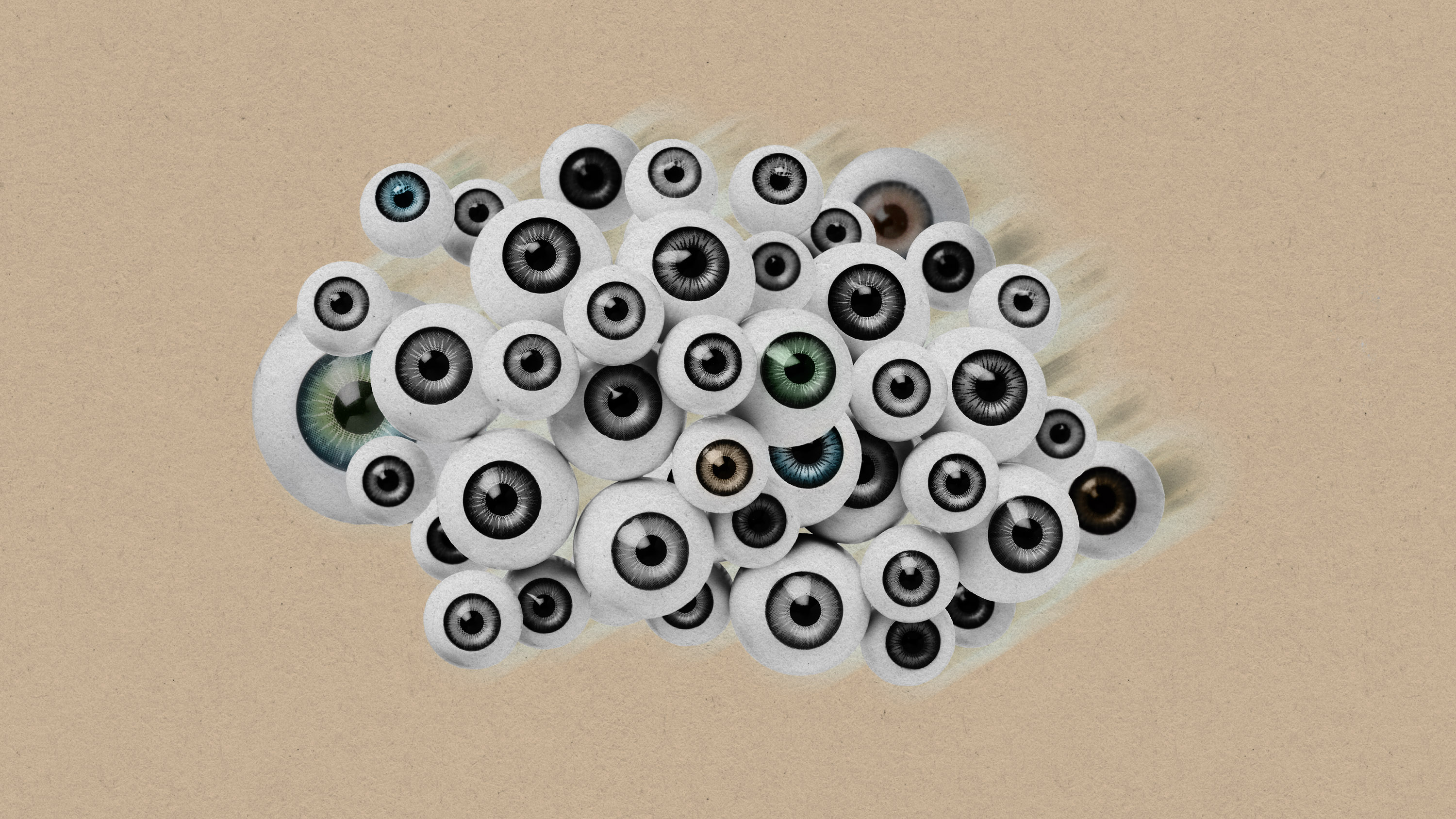 colored and black and white eyes in a group vaguely shaped like a cloud