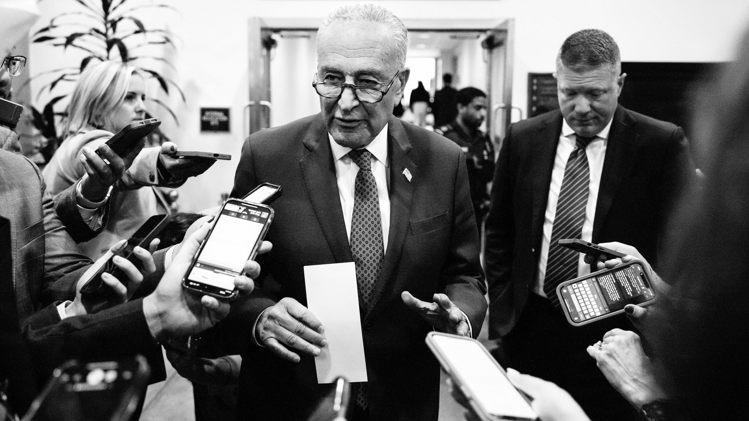 Senate Majority Leader Chuck Schumer speaking to reporters